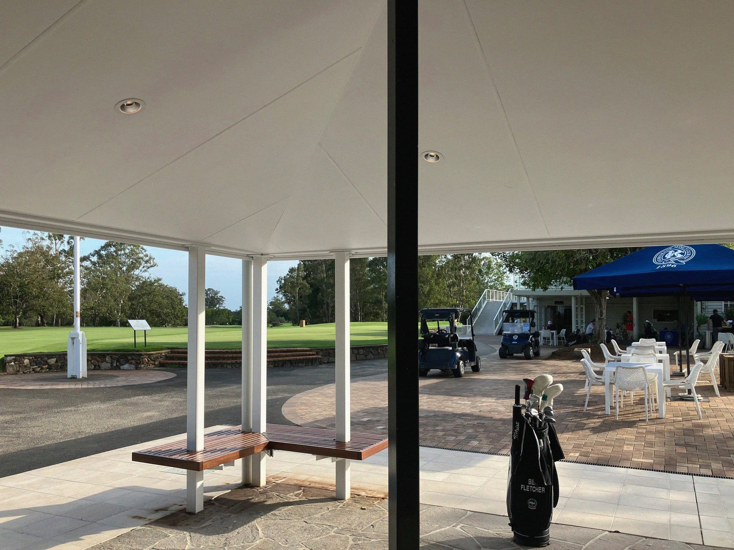 The covered terrace facing the course.