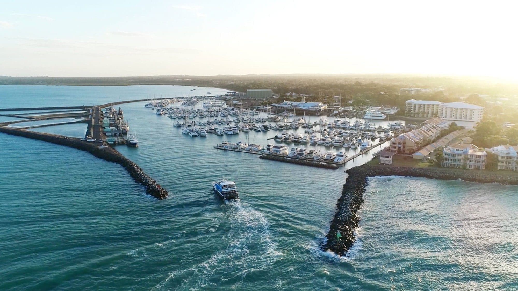 Aerial view of the Urangan marina, where the club sits on the water's edge.