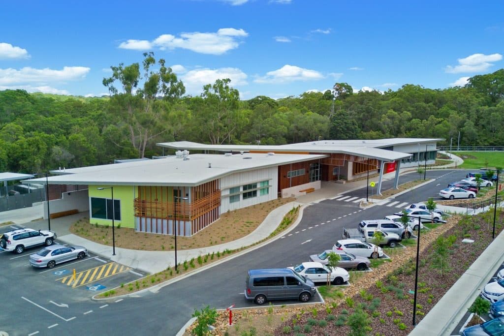 The centre's buildings and parking seen from above.