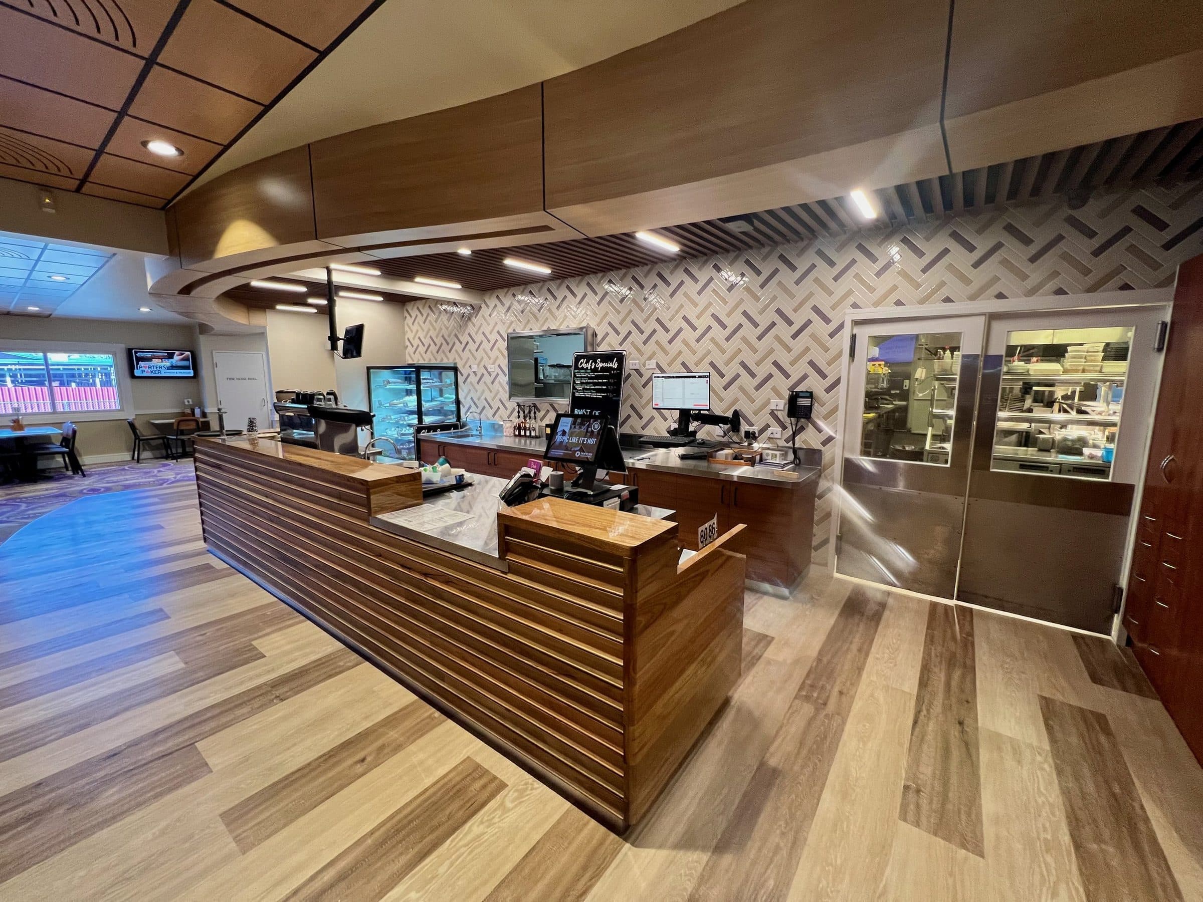 The servery counter and kitchen doors.